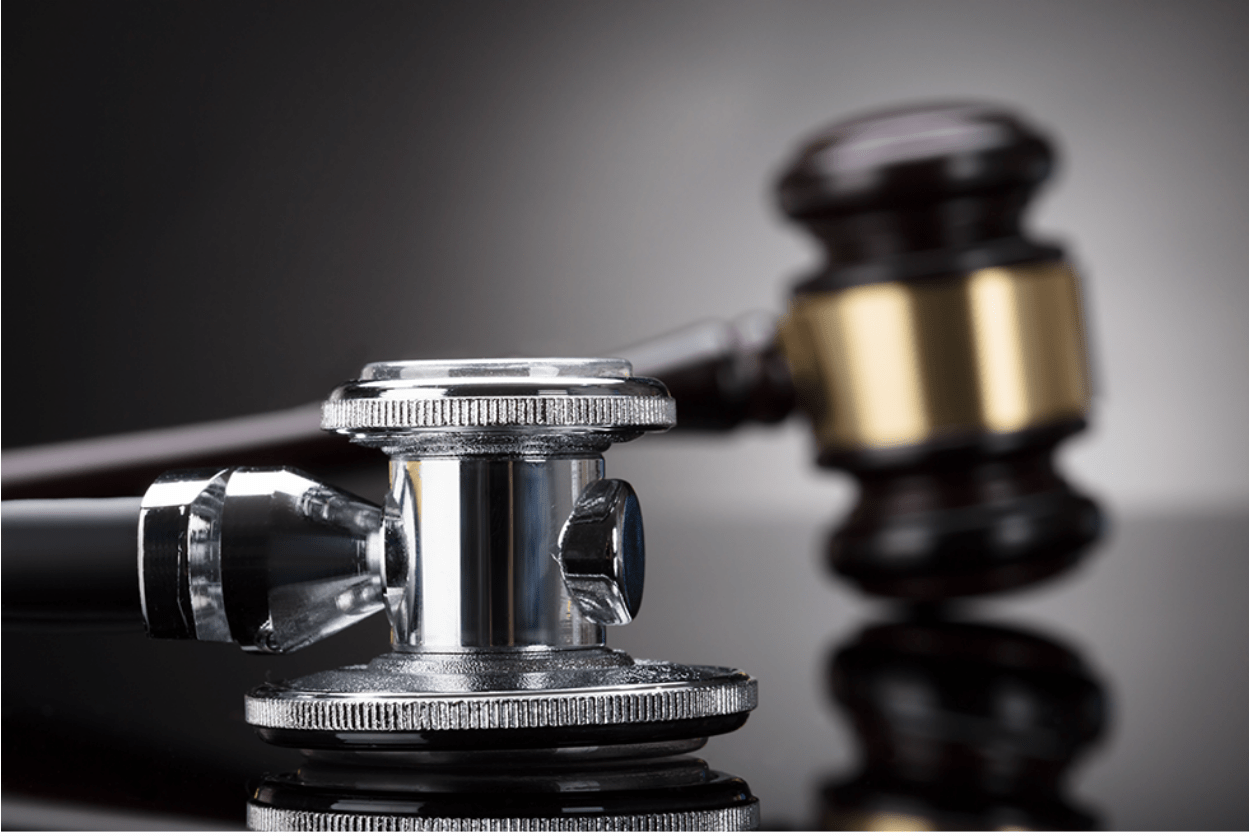 A stethoscope and gavel symbolizing medical malpractice